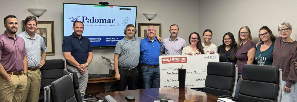 Group photo of Palomat team accepting Rich & Cartmill. Inc R&C Cares donation.